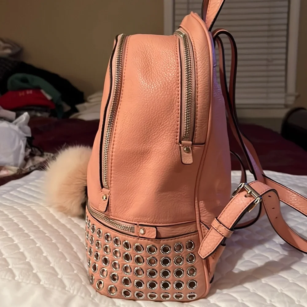 Michael Kors Rhea Medium Silver-Ringed Backpack with Fur Pompom in Coral…